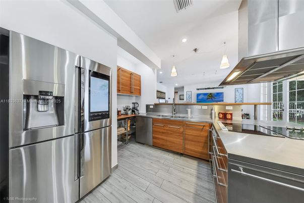 Interior, Kitchen, Pendant Lights, Recessed Lighting, Stainless Steel Appliances, Wood Texture Flooring
