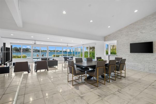 Dining room, Interior, Living room, Marble, Recessed Lighting, Stone Walls, Water