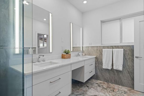 Bathroom, Dual Sink Vanities, Glass Shower, Interior, Marble, Recessed Lighting