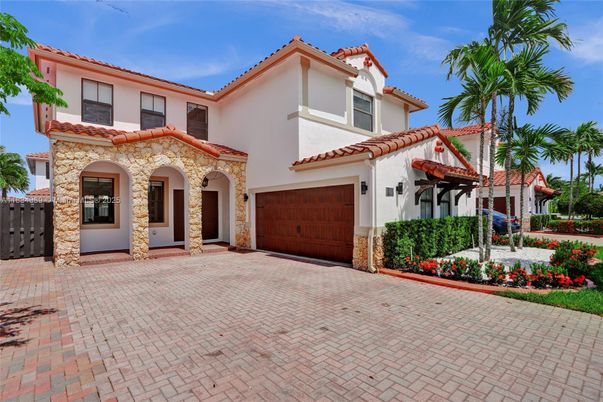 Attached, Exterior, Facade, Spanish Mediterranean