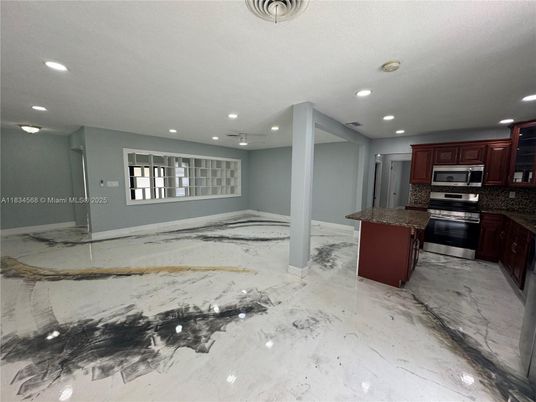 Empty room, Interior, Kitchen, Marble, Recessed Lighting, Stainless Steel Appliances