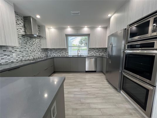 Interior, Kitchen, Recessed Lighting, Stainless Steel Appliances, Wood Texture Flooring