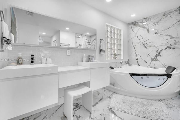 Bathroom, Dual Sink Vanities, Interior, Marble, Marble Walls, Recessed Lighting