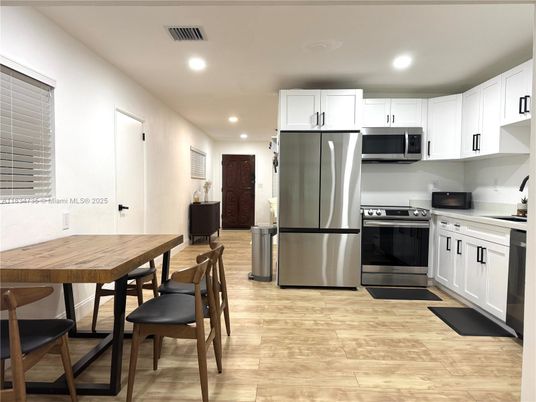 Interior, Kitchen, Recessed Lighting, Stainless Steel Appliances, Wood Texture Flooring