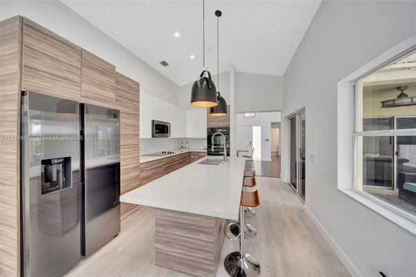 Interior, Kitchen, Pendant Lights, Recessed Lighting, Stainless Steel Appliances, Wood Texture Flooring