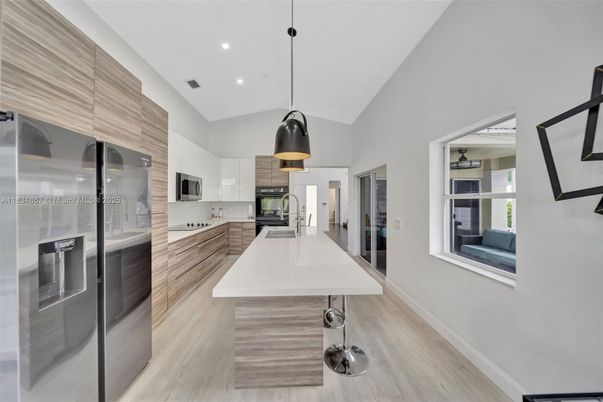 Interior, Kitchen, Pendant Lights, Recessed Lighting, Stainless Steel Appliances, Wood Texture Flooring