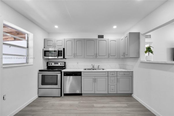 Interior, Kitchen, Recessed Lighting, Stainless Steel Appliances, Wood Texture Flooring