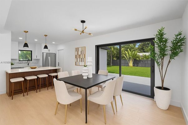 Dining room, Interior, Kitchen, Pendant Lights, Recessed Lighting, Stainless Steel Appliances, Wood Texture Flooring