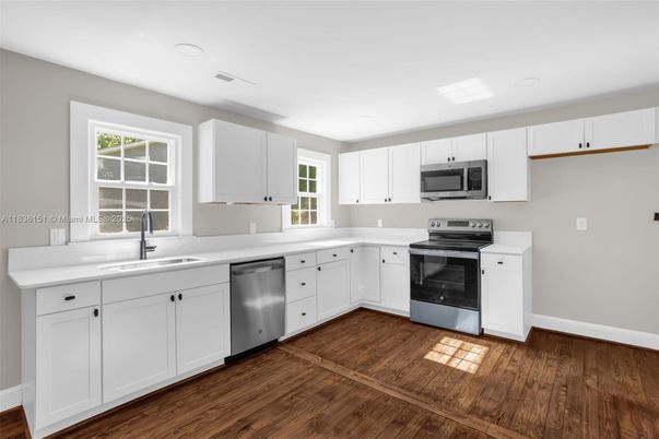 Interior, Kitchen, Recessed Lighting, Stainless Steel Appliances, Wood Texture Flooring