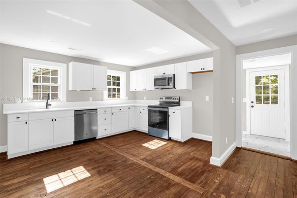 Interior, Kitchen, Recessed Lighting, Stainless Steel Appliances, Wood Texture Flooring
