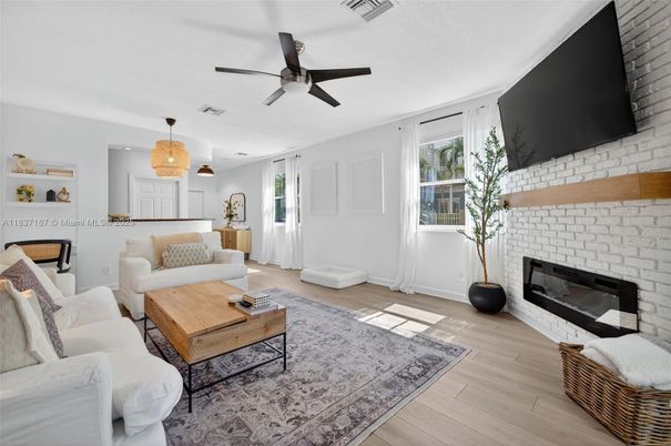 Fireplace, Interior, Living room, Pendant Lights, Stone Walls, Wood Texture Flooring