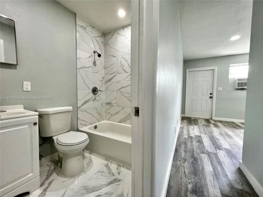 Bathroom, Interior, Marble, Marble Walls, Recessed Lighting, Wood Texture Flooring