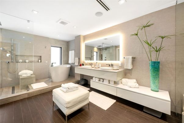 Bathroom, Dual Sink Vanities, Free Standing Baths, Glass Shower, Interior, Recessed Lighting, Wood Texture Flooring