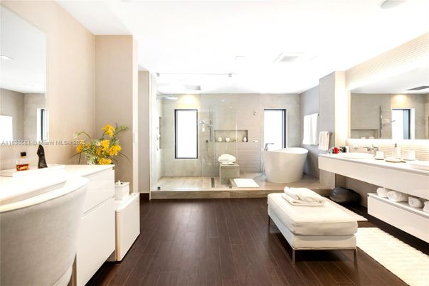 Bathroom, Dual Sink Vanities, Free Standing Baths, Glass Shower, Interior, Wood Texture Flooring