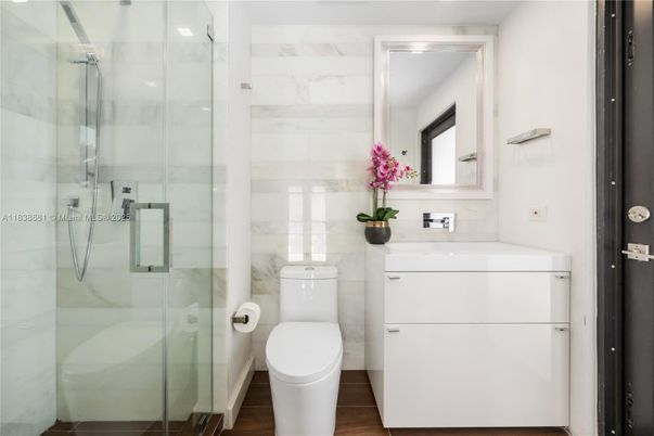 Bathroom, Glass Shower, Interior, Marble Walls, Wood Texture Flooring