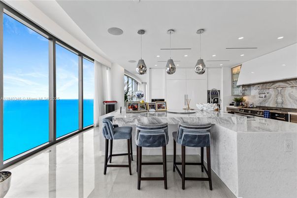 Interior, Kitchen, Marble Walls, Pendant Lights, Recessed Lighting, Stainless Steel Appliances, Water