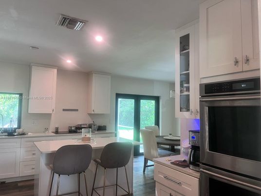 Dining room, Interior, Kitchen, Recessed Lighting, Stainless Steel Appliances, Wood Texture Flooring