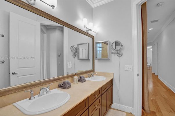 Bathroom, Dual Sink Vanities, Interior, Recessed Lighting, Wood Texture Flooring