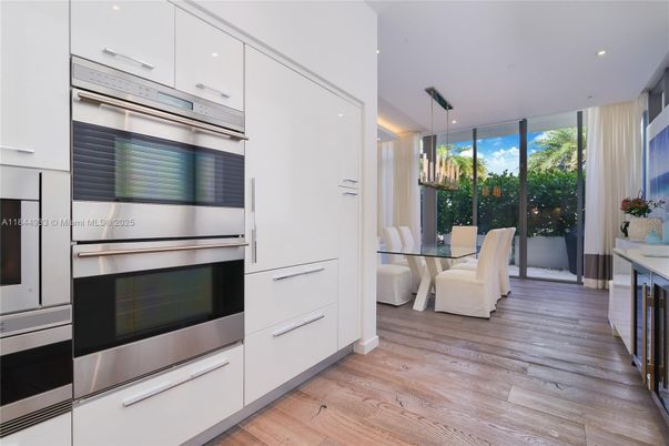 Dining room, Interior, Kitchen, Recessed Lighting, Stainless Steel Appliances, Wood Texture Flooring