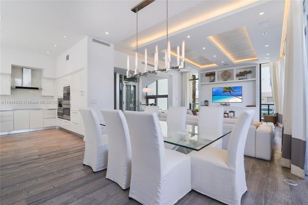 Dining room, Interior, Kitchen, Pendant Lights, Recessed Lighting, Stainless Steel Appliances, Wood Texture Flooring