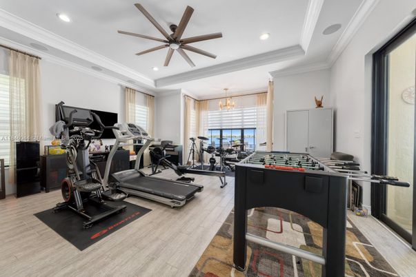Chandelier, Fitness Equipment, Gym, Interior, Recessed Lighting, Wood Texture Flooring