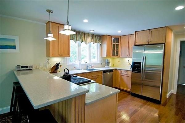 Interior, Kitchen, Wood Texture Flooring, Recessed Lighting, Stainless Steel Appliances, Pendant Lights