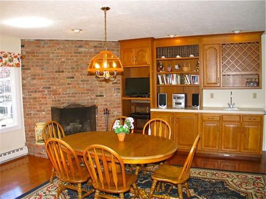 Interior, Kitchen, Wood Texture Flooring, Recessed Lighting, Dining room, Fireplace, Chandelier, Stone Walls, Pendant Lights