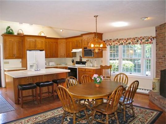 Interior, Kitchen, Wood Texture Flooring, Recessed Lighting, Dining room, Chandelier, Stainless Steel Appliances, Tile Countertops, Pendant Lights