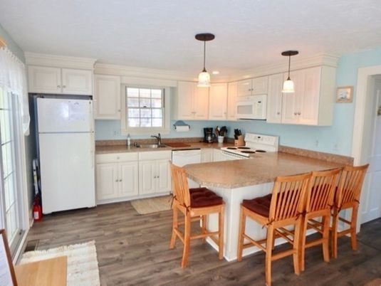 Interior, Kitchen, Wood Texture Flooring, Dining room, Stainless Steel Appliances, Pendant Lights