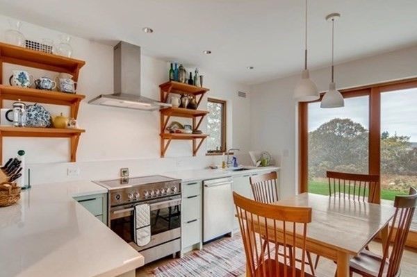 Interior, Kitchen, Wood Texture Flooring, Recessed Lighting, Dining room, Stainless Steel Appliances, Pendant Lights