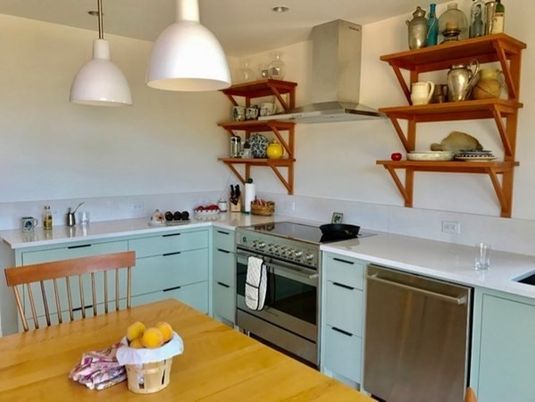 Interior, Kitchen, Wood Texture Flooring, Recessed Lighting, Stainless Steel Appliances, Pendant Lights