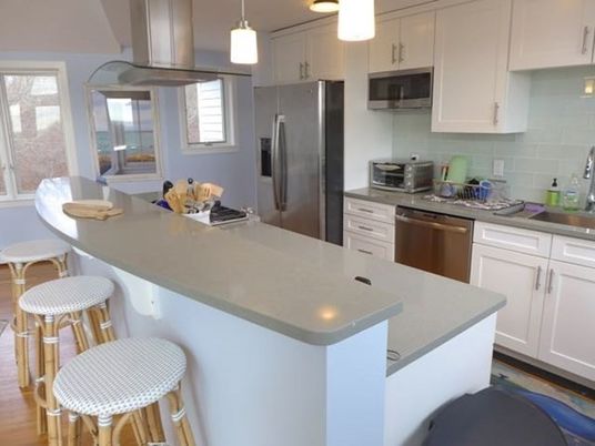 Interior, Kitchen, Wood Texture Flooring, Recessed Lighting, Dining room, Stainless Steel Appliances, Pendant Lights