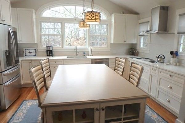 Interior, Kitchen, Wood Texture Flooring, Recessed Lighting, Stainless Steel Appliances, Pendant Lights