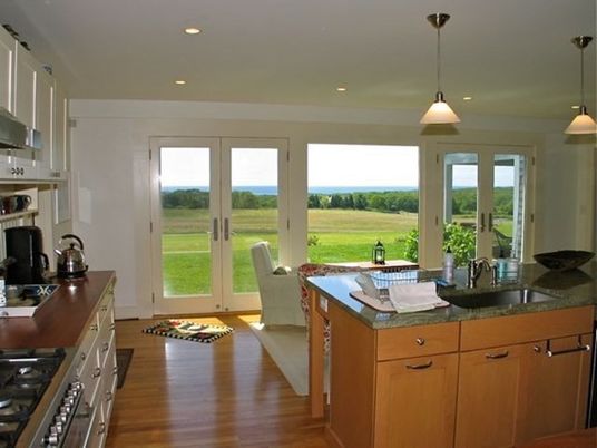 Interior, Kitchen, Wood Texture Flooring, Recessed Lighting, Dining room, Stainless Steel Appliances, Pendant Lights