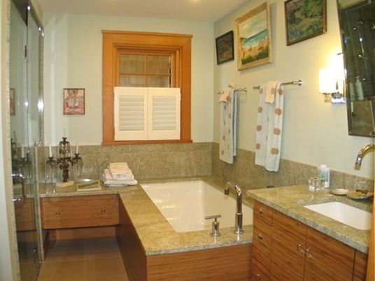 Interior, Bathroom, Recessed Lighting, Glass Shower, Ceramic Tile, Dual Sink Vanities