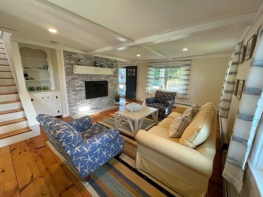 Fireplace, Interior, Living room, Recessed Lighting, Stone Walls, Wood Texture Flooring