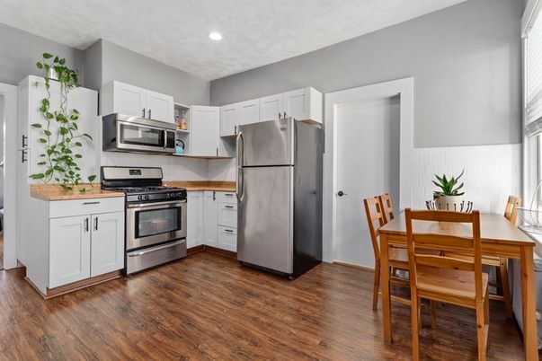 Dining room, Interior, Kitchen, Recessed Lighting, Stainless Steel Appliances, Wood Texture Flooring