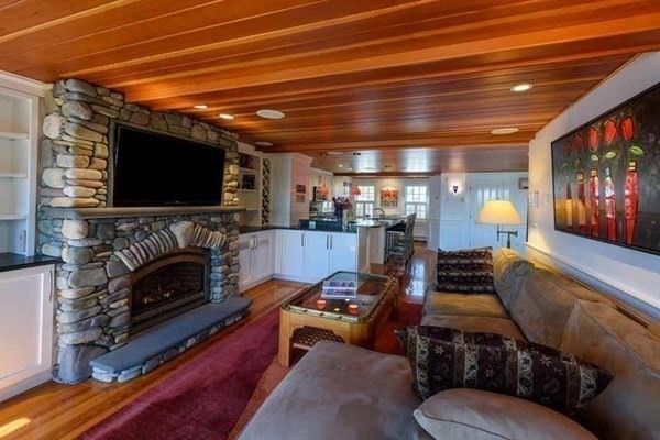 Fireplace, Interior, Living room, Recessed Lighting, Stone Walls, Wooden Ceilings, Wood Texture Flooring