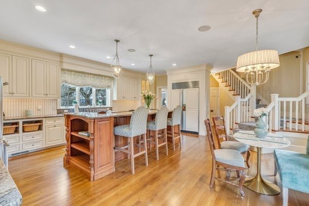 Chandelier, Dining room, Interior, Kitchen, Pendant Lights, Recessed Lighting, Stainless Steel Appliances, Wood Texture Flooring