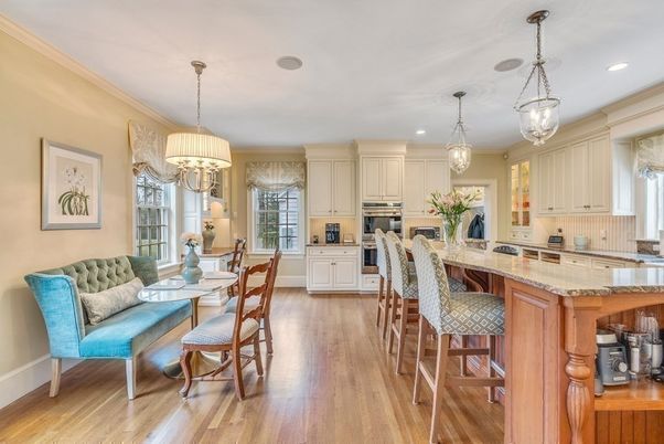 Chandelier, Dining room, Interior, Kitchen, Living room, Pendant Lights, Recessed Lighting, Stainless Steel Appliances, Wood Texture Flooring