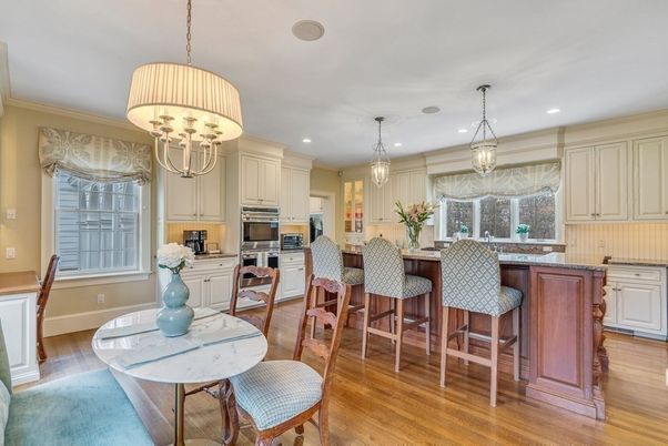 Chandelier, Dining room, Interior, Kitchen, Pendant Lights, Recessed Lighting, Stainless Steel Appliances, Wood Texture Flooring