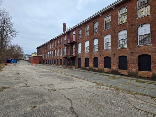 Exterior, Facade, Brick Facade, Condo Building