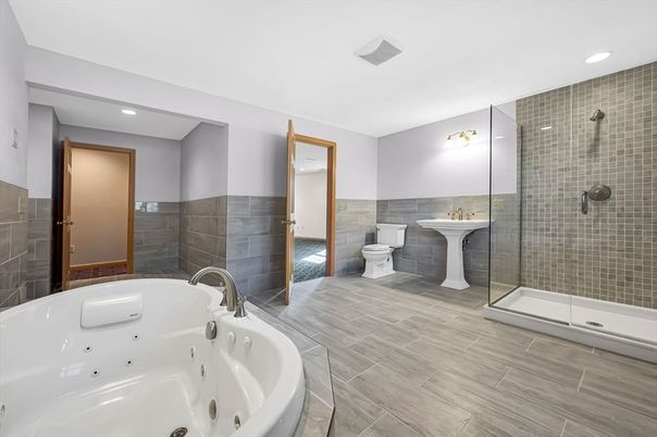 Bathroom, Free Standing Baths, Glass Shower, Interior, Recessed Lighting, Wood Texture Flooring