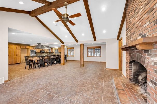 Dining room, Fireplace, Interior, Kitchen, Recessed Lighting, Stone Walls, Wooden Beams
