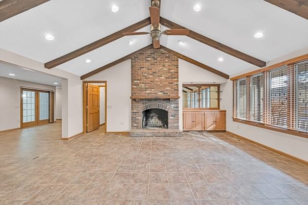 Empty room, Fireplace, Interior, Recessed Lighting, Stone Walls, Wooden Beams