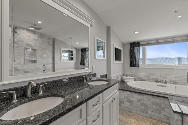 Bathroom, Dual Sink Vanities, Glass Shower, Interior, Recessed Lighting, Stone Walls