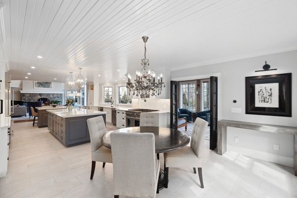Chandelier, Dining room, Fireplace, Interior, Kitchen, Living room, Pendant Lights, Recessed Lighting, Stainless Steel Appliances