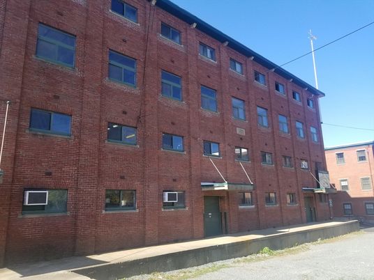 Exterior, Facade, Brick Facade, Condo Building