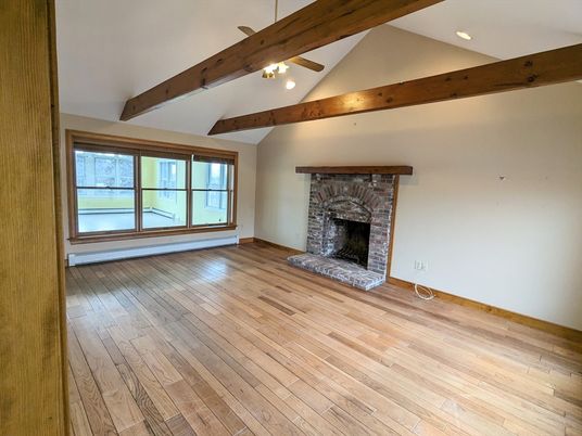 Empty room, Fireplace, Interior, Recessed Lighting, Wooden Beams, Wood Texture Flooring