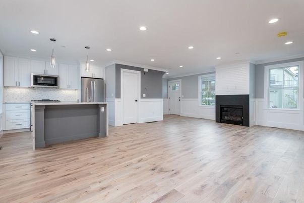 Fireplace, Interior, Kitchen, Pendant Lights, Recessed Lighting, Stainless Steel Appliances, Wood Texture Flooring